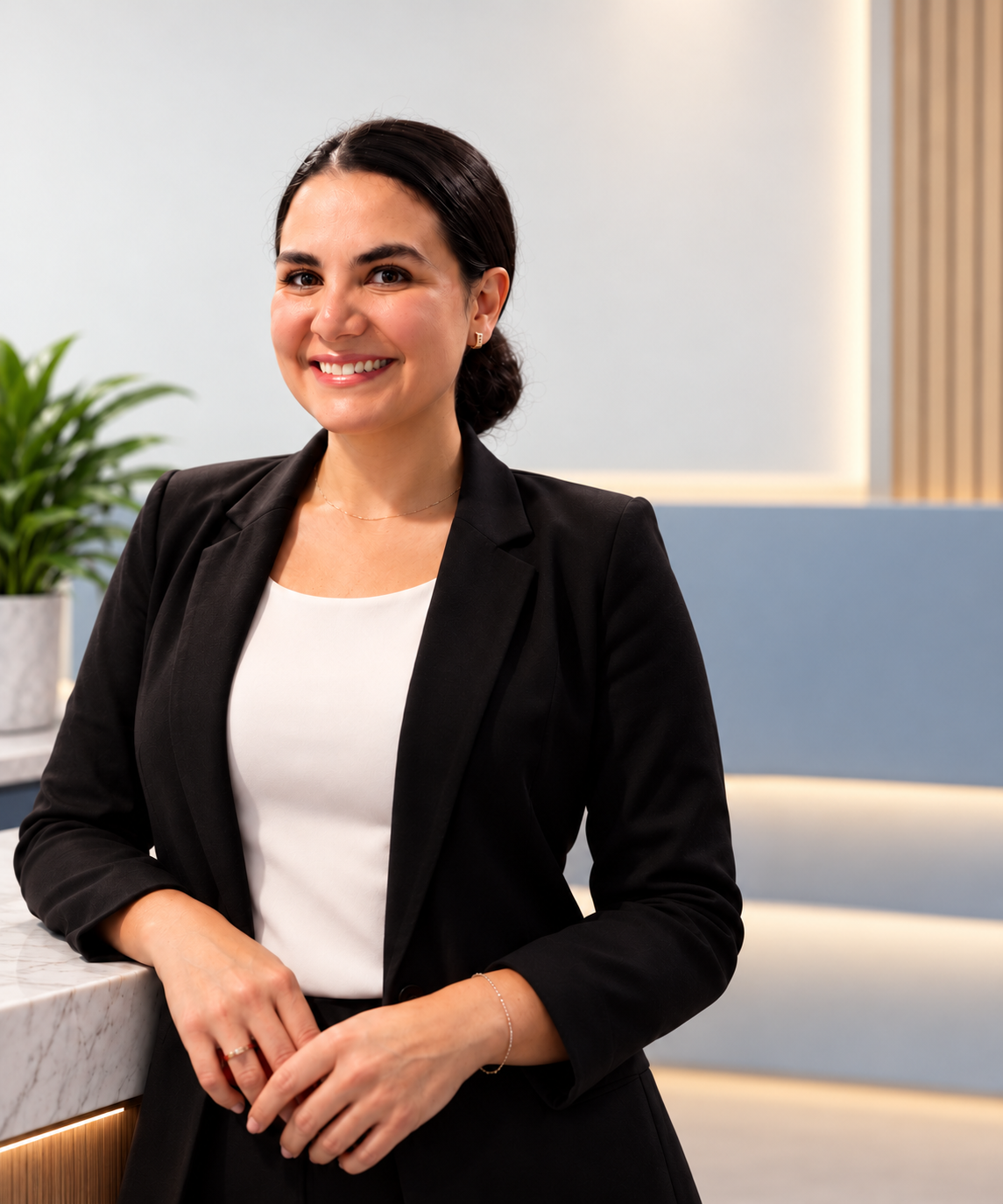 Juliana León in a black business suit